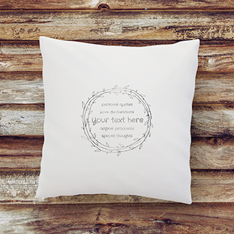 my own text printed on a quality cushion with wreath graphic decor