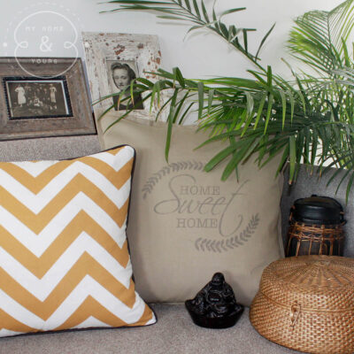 Hand printed home sweet home cushion with foliage details