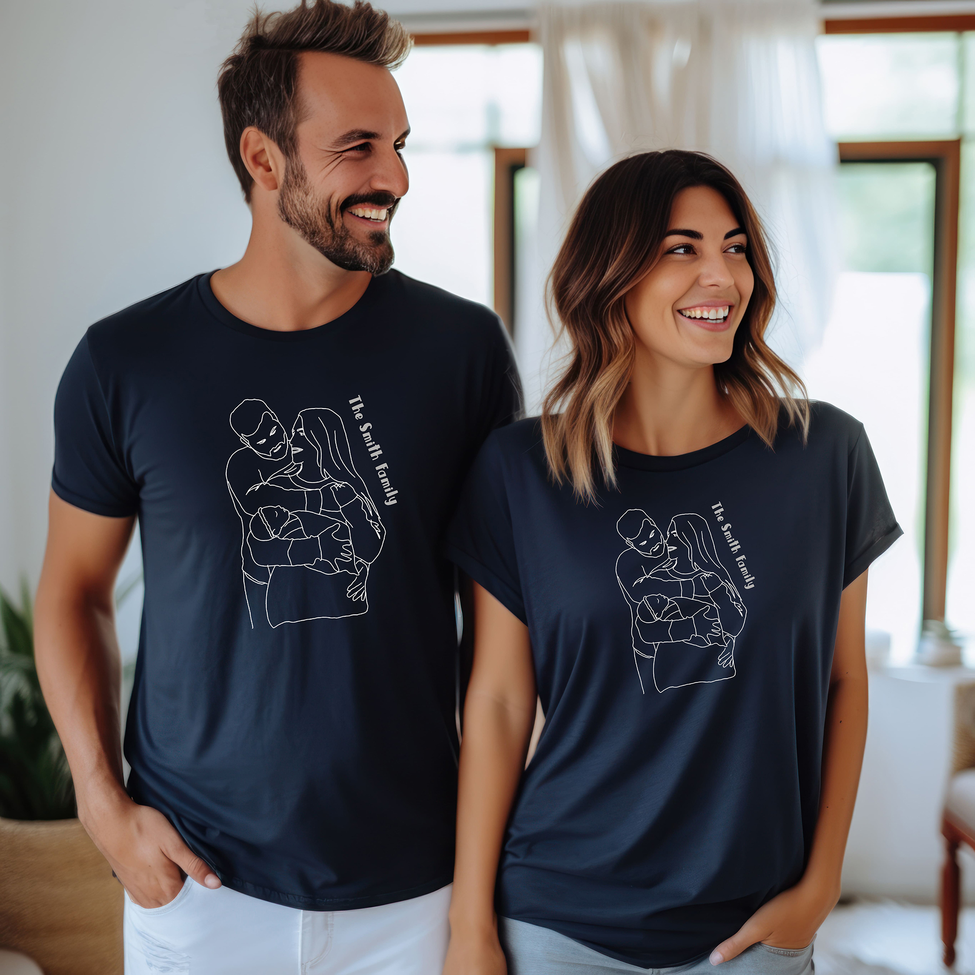 matching Navy T shirt with line art portrait of new parents with their new born
